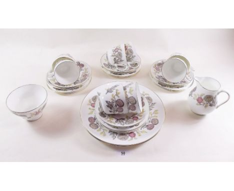 A Wedgwood  'Lichfield'  tea service comprising: eight cups and saucers, eight tea plates, milk, sugar and two cake plates