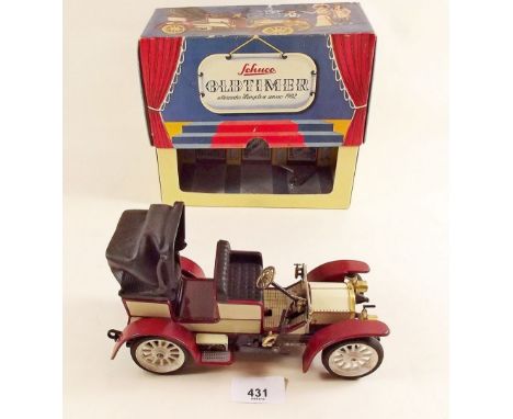 A Schuco Old Timer Mercedes Simplex 32PS No 1229, 1902 model, boxed with instructions and key - good condition 