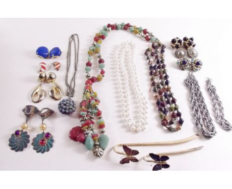 A box of vintage earrings and bead necklaces etc