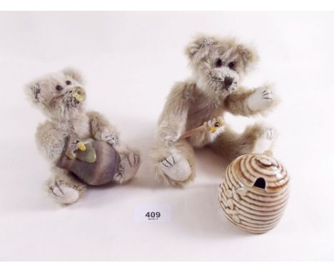Two vintage teddy bears with honey pot 