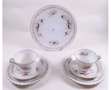 A Edwardian Royal Albert floral printed tea service comprising: six cups and saucers, six plates and cake plate 