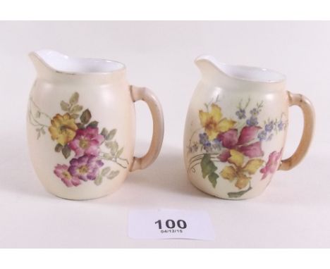 Two Royal Worcester floral painted ivory blush cream jugs , 1897