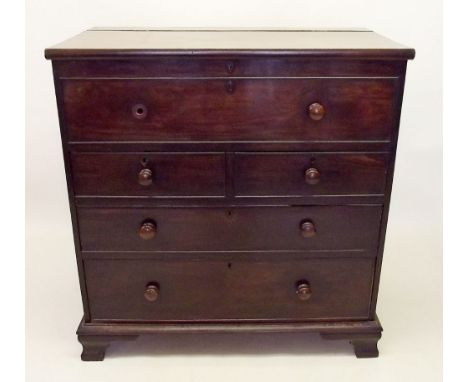A Victorian mahogany Scotch chest of drawers with rise top over two short and two long drawers