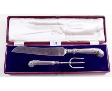 A cased silver handled cake serving knife and fork