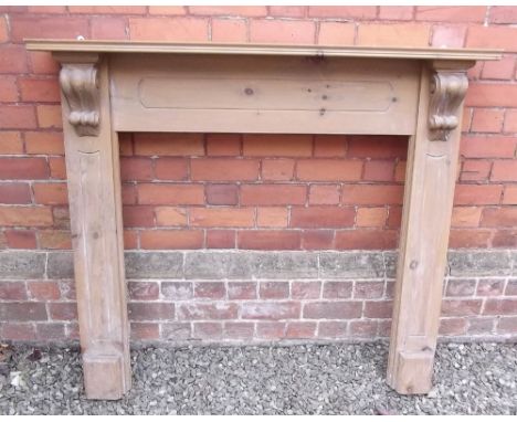 A pine fire place surround - 129 x 119cm
