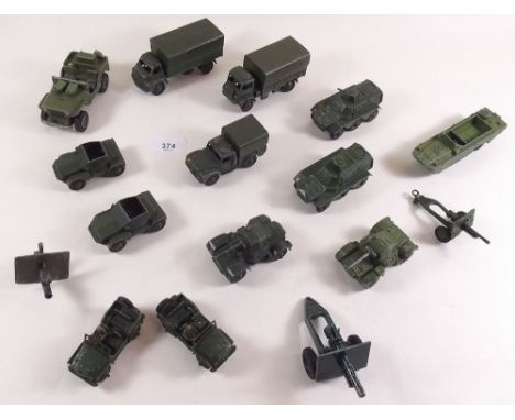 A quantity of Dinky and Corgi die cast army vehicles to include tanks, trucks, jeeps, guns, personnel carriers, armoured cars