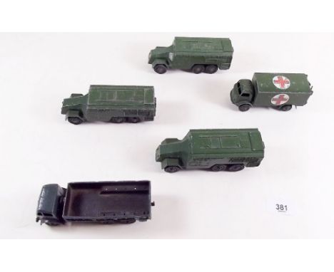 A Dinky military ambulance, three armoured command vehicle and a ten ton army truck