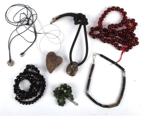A collection of good costume jewellery necklaces to include black glass beads, and a jade coloured square stone necklace with
