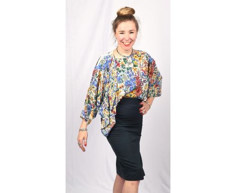 GIANNI VERSACE a 1980s-90s silk skirt-suit comprising floral blouse jacket and green (wool) skirt (Fits UK 10-12)  (3 items) 
