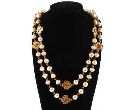CHANEL Boxed necklace with faux pearl and a floral CHANEL insignia, Opera length (88cm drop) with a box clasp with the CHANEL