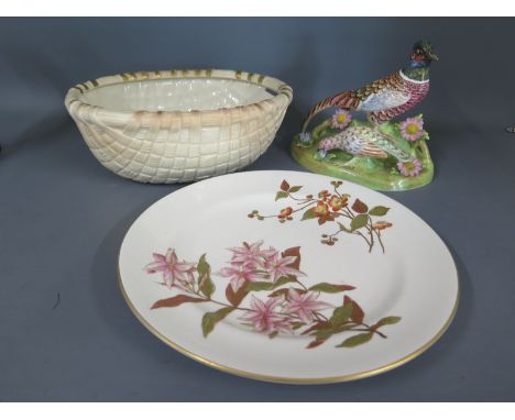 A Worcester plate date 1890 decorated with foliate design, a Locke and Co Ltd. Worcester weave pattern bowl with gilt highlig