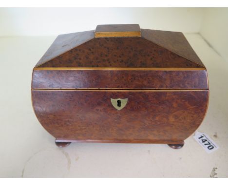 A 19th century burr walnut tea caddy of two compartments raised on small bun feet - 20cm x 13cm x 16cm