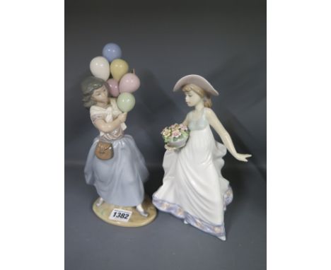 Two Lladro figures - Girl with Balloon and Girl with Flowers - Height 26cm and 23cm - both good condition