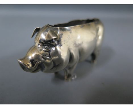 An Edward VII silver pin cushion formed as a pig, Birmingham 1906 maker BP/DC - Length 7cmCondition report: Lacking liner and