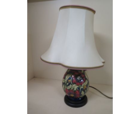 A Moorcroft Pheasants eye pattern table lamp with shade - Base height 23cm - Height including shade 43cm Condition report: So