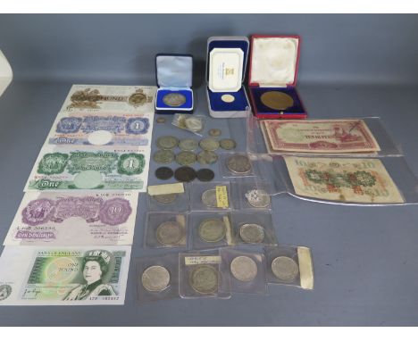A selection of pre 1946 British coinage, some pre 1919, a ten shilling note, a George V one pound note, two one pound notes s