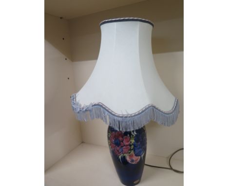 A Moorcroft Anemone pattern table lamp with shade - Base height 33cm  - Height including shade 66cm Condition report: General