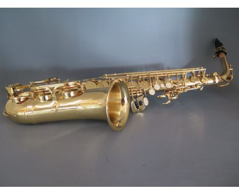 A modern Vivace Alto Saxophone with travel case and cleaning tools currently retails at around £300Condition report: As new c
