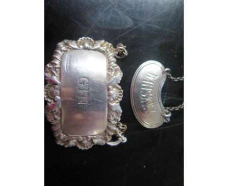 Two silver decanter labels with chain mounts - Sheffield and Birmingham hallmarks - various dates and makers - Largest length