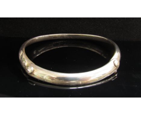 A Georg Jensen silver bangle designed by Vivianna Torun 36.4g, boxed