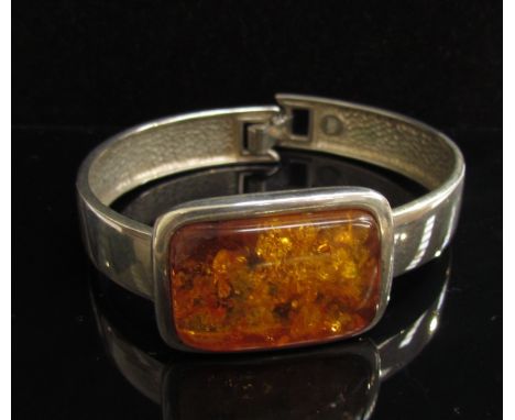 An amber set hinged bangle stamped S&amp;A 925