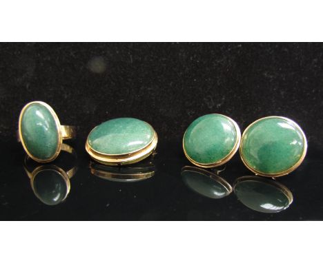 A suite of cabochon green stone jewellery, circular brooch/pendant, earrings and ring. Size O, all stamped 14k, 23.5g