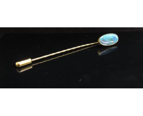 A hat/stick pin with oval opal, unmarked, 8.5cm long