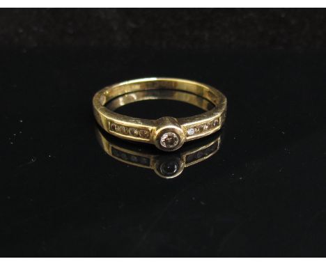 A 9ct gold diamond ring. Size Q/R, 1.8g