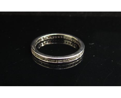 A white gold full eternity diamond ring. Size Q, 2.3g