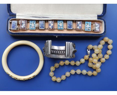 An Italian mosaic bracelet, a jade coloured bead necklace & two bangles (4)