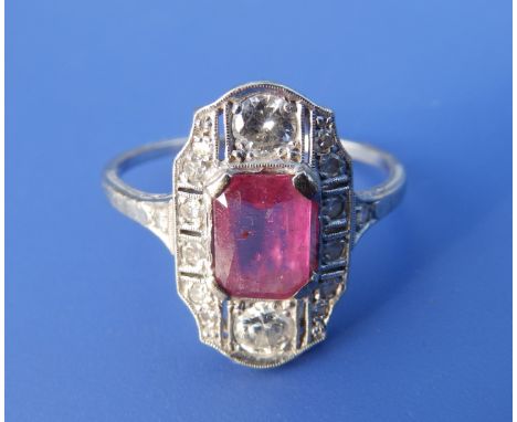 A ruby & diamond set white cluster style panel ring