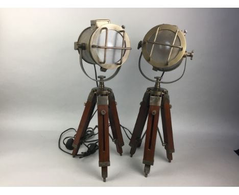 PAIR OF BRASS MARINE SEARCHLIGHT STYLE TABLE LAMPS, each on tripod stand, 55cm high (adjustable)