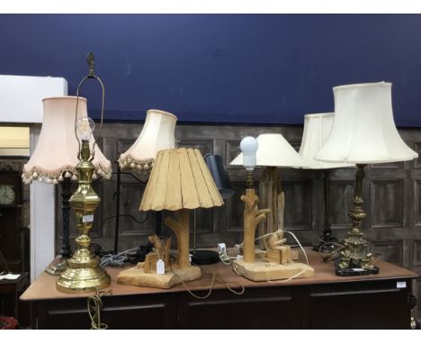 PAIR OF REPRODUCTION ‘CANDLESTICK’ TABLE LAMPS, of George III design, with shades, along with a ‘driftwood’ table lamp, brass