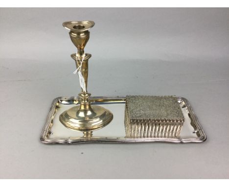 SILVER TABLE CANDLESTICK, along with a Continental silver casket and a Continental silver liquer tray, 38cm x 17cm (3)