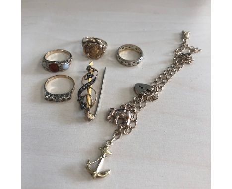 OPAL AND GEMSTONE DRESS RING, set in nine carat gold, along with a gold coin ring, two other rings, a charm bracelet and a br