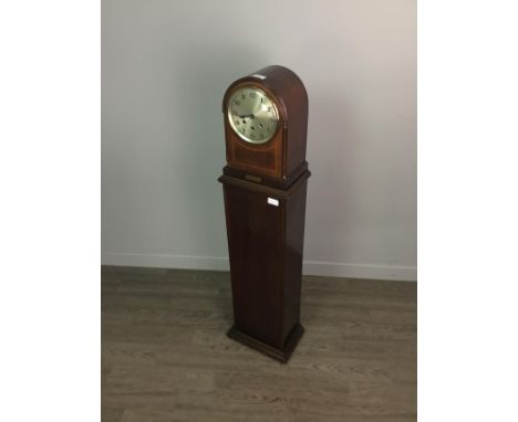 EDWARDIAN MANTEL CLOCK ON PEDESTAL BASE, with three train eight day movement, the silvered dial with Arabic numerals, the dom