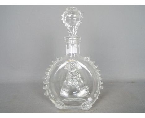 A Remy Martin decanter by Baccarat, with stopper.