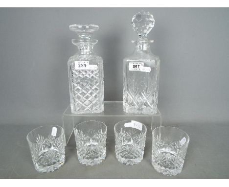 An Edinburgh International Crystal decanter and four tumblers and one further decanter by Stuart Crystal. [6]