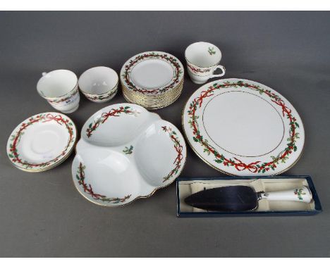 Royal Worcester - A quantity of Royal Worcester ceramics in the Holly Ribbons pattern.