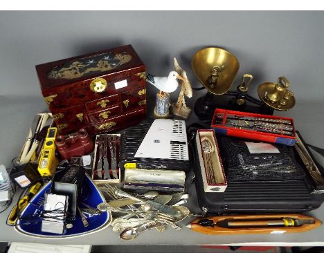 General - A box containing mixed items including a kitchen scale with weights, various boxes of plated cutlery, a HP projecto