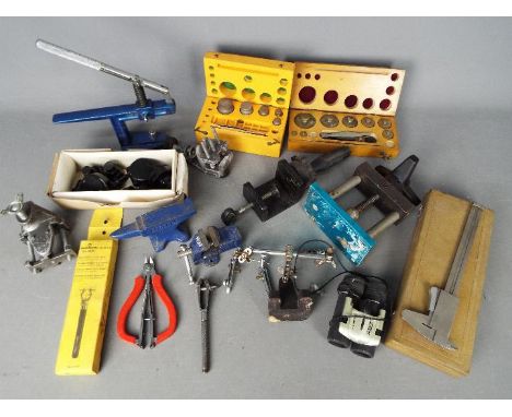 A collection of watchmakers / repairers tools and similar.