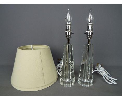 Lamps - Two heavy glass table lamps in near mint condition with cream coloured lamp shades measuring 28cm without shades 39cm