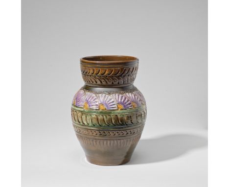 Dr Christopher Dresser: Made by Linthorpe PotteryVase, circa 1880Pottery, decorated with a frieze of overlapping flowers and 