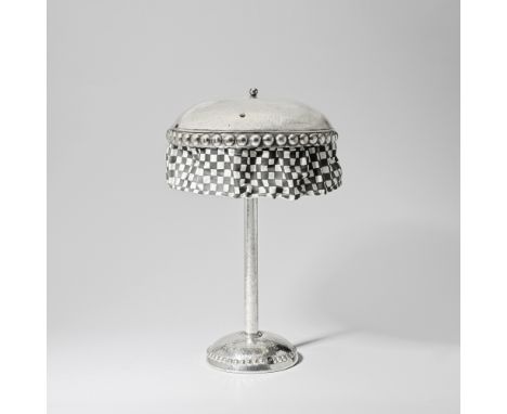 In the Austrian styleTable lamp, 20th centuryPlated brass and steel, the domed shade, stem and base with hammered finish; wit