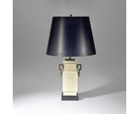 FrenchTable lamp, 20th centuryParchment covered-wood base, ebonised wood, brass, foil-lined paper shade.79.5 cm high This lot