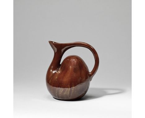 Dr Christopher Dresser: Made by Linthorpe PotteryHump-backed jug, circa 1880Pottery, extend handle, incised motifs, streaked 