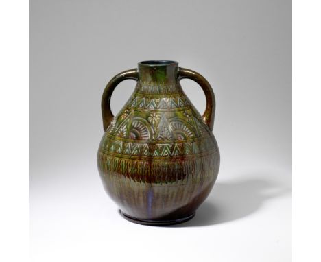 Dr Christopher Dresser: Made by Linthorpe PotteryTwin-handled vase, circa 1880Pottery, the swollen form embellished with a de