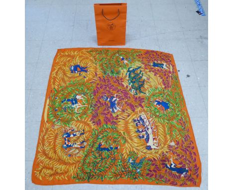 A Hermes silk and wool scarf, designed by Annie Faivre&nbsp; 50"sq in a Hermes bag