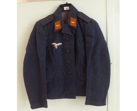 A German Luftwaffe blue/grey blouse (Please Note: this lot is subject to the statement made in the Auctioneers Glossary of Ce