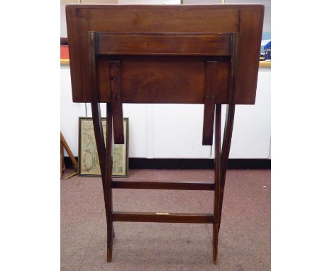 An Edwardian satinwood string inlaid mahogany campaign design, folding card table, enclosing a brown fabric lined playing sur